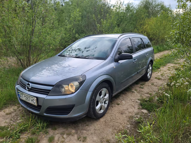 Opel Astra - фото 1