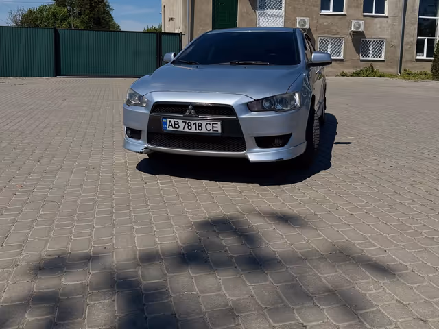 Mitsubishi Lancer - фото 1