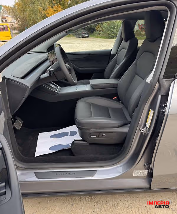 Tesla Model Y - фото 7