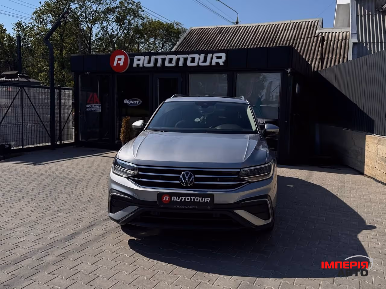 Volkswagen Tiguan - фото 1