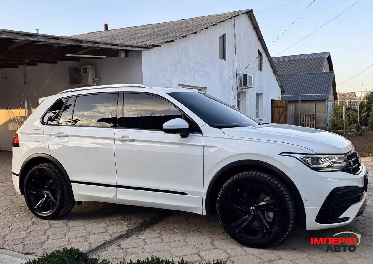 Volkswagen Tiguan - фото 12