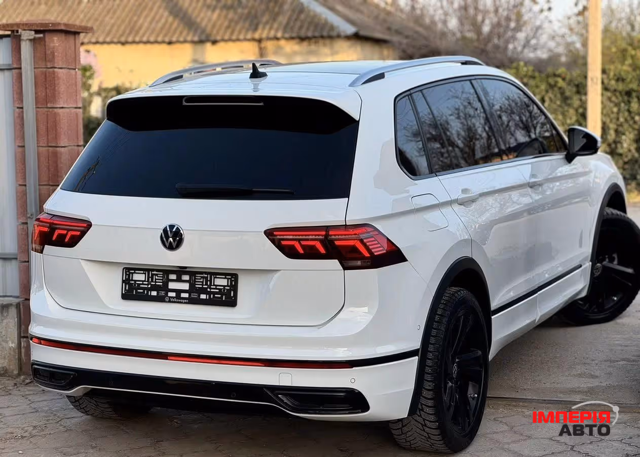 Volkswagen Tiguan - фото 11