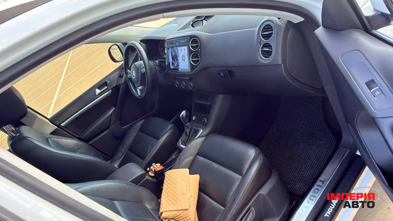 Volkswagen Tiguan - фото 25