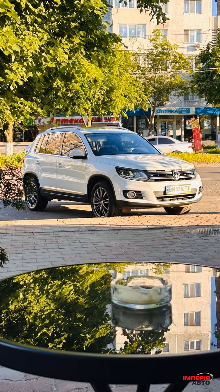 Volkswagen Tiguan - фото 1