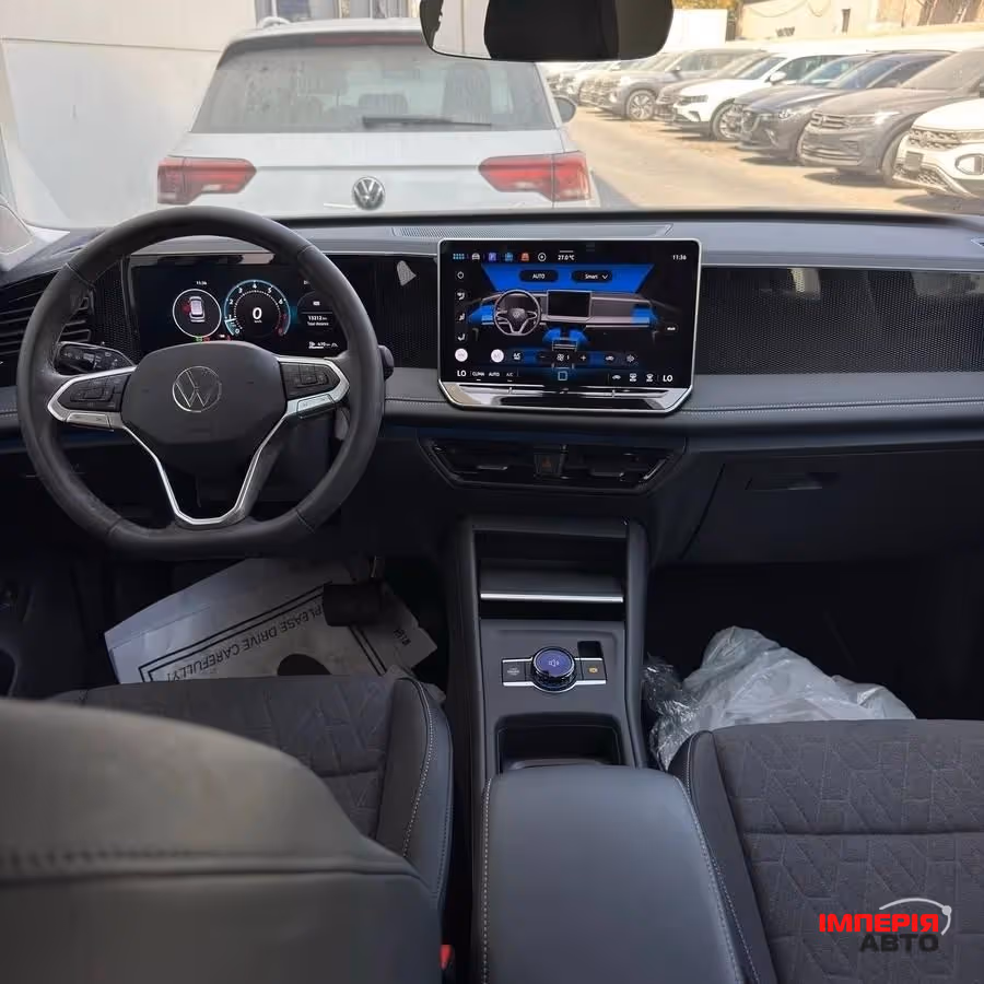 Volkswagen Tiguan - фото 4