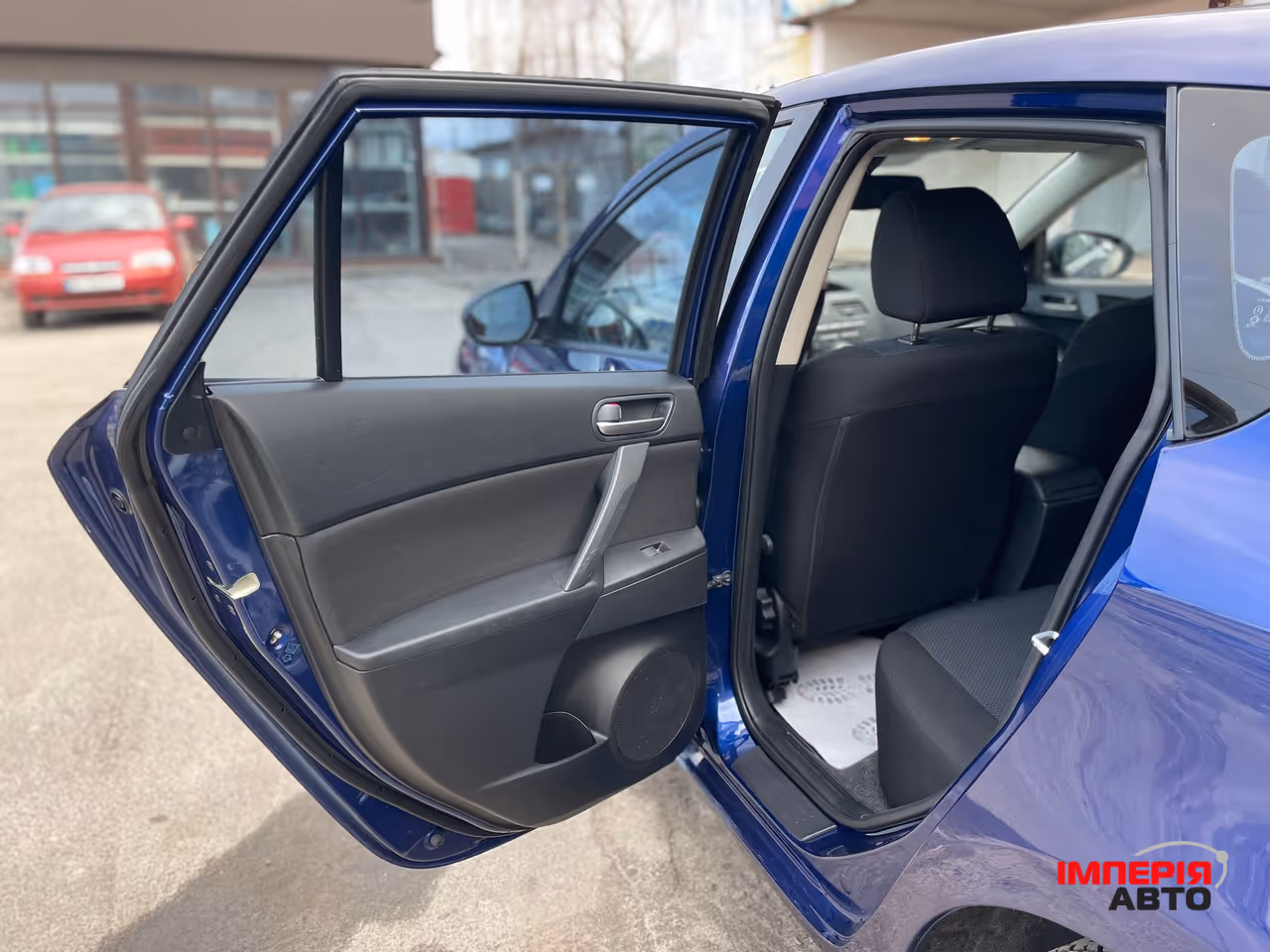 Mazda 3 - фото 34