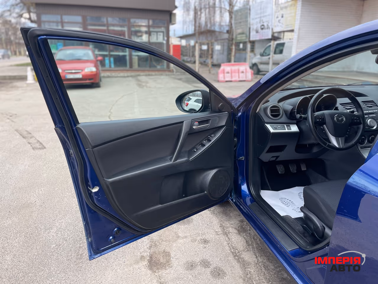 Mazda 3 - фото 13
