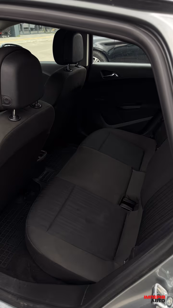 Opel Astra - фото 11