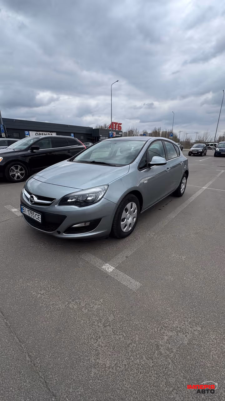 Opel Astra - фото 1