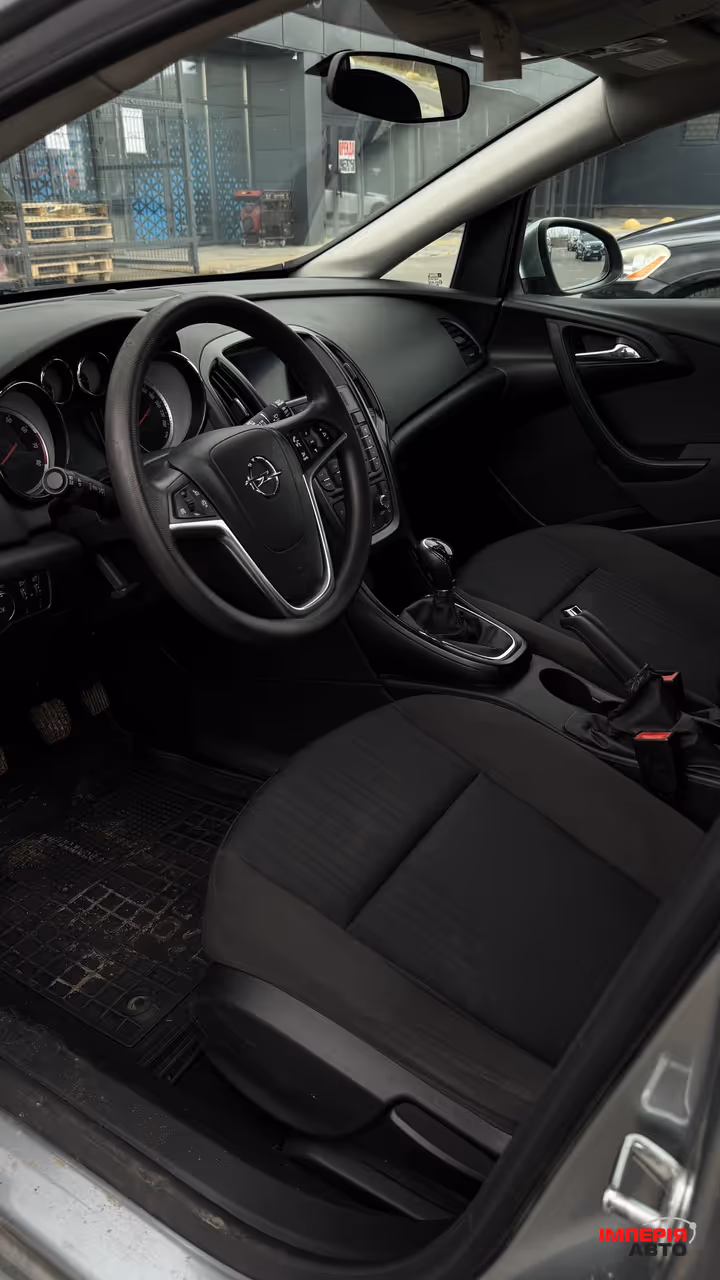 Opel Astra - фото 7