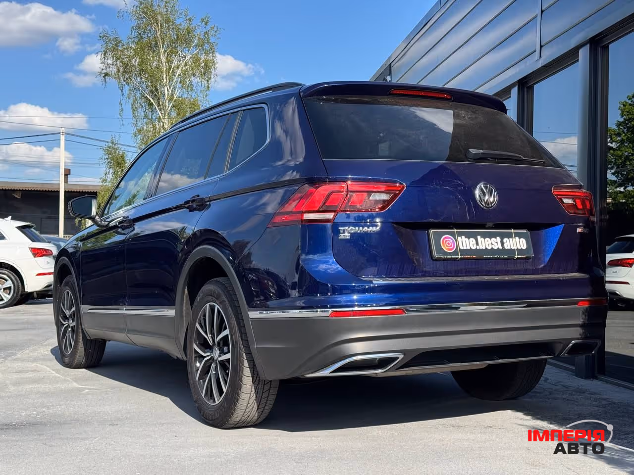 Volkswagen Tiguan - фото 8