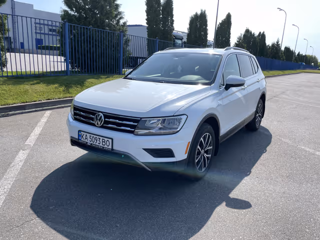 Volkswagen Tiguan - фото 1