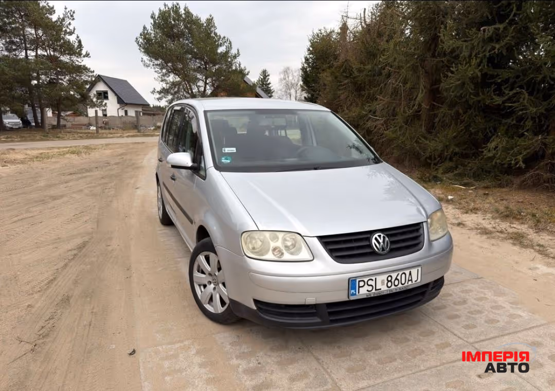 Volkswagen Touran - фото 2