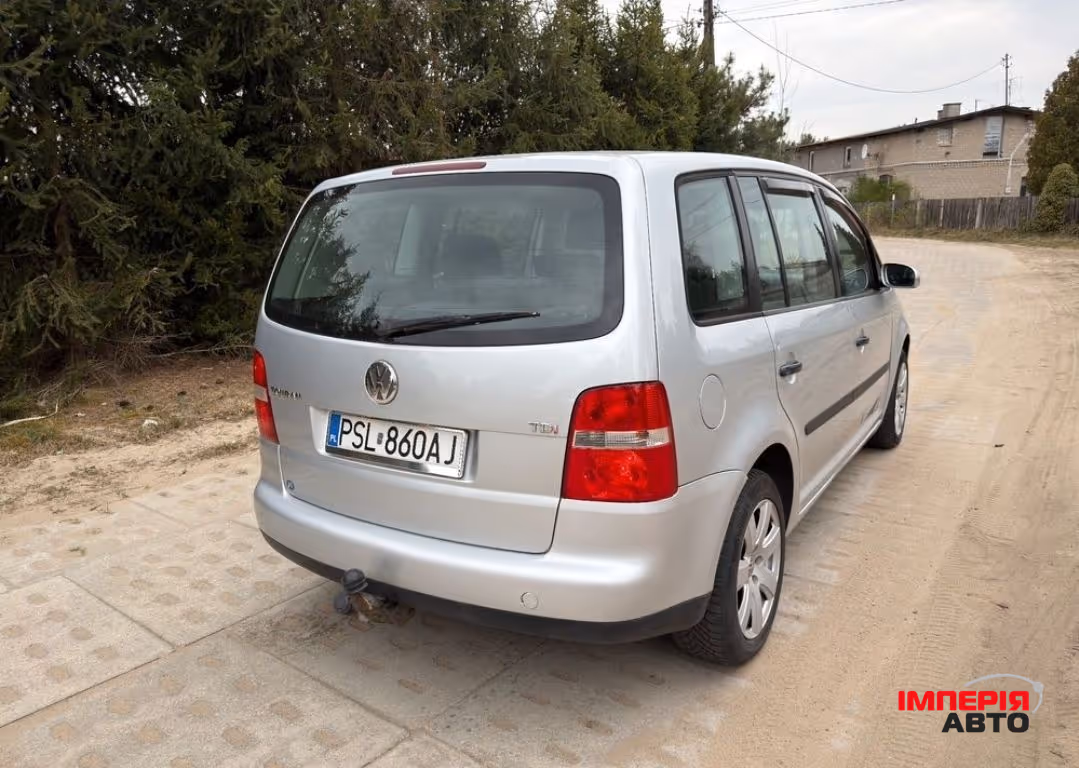 Volkswagen Touran - фото 4