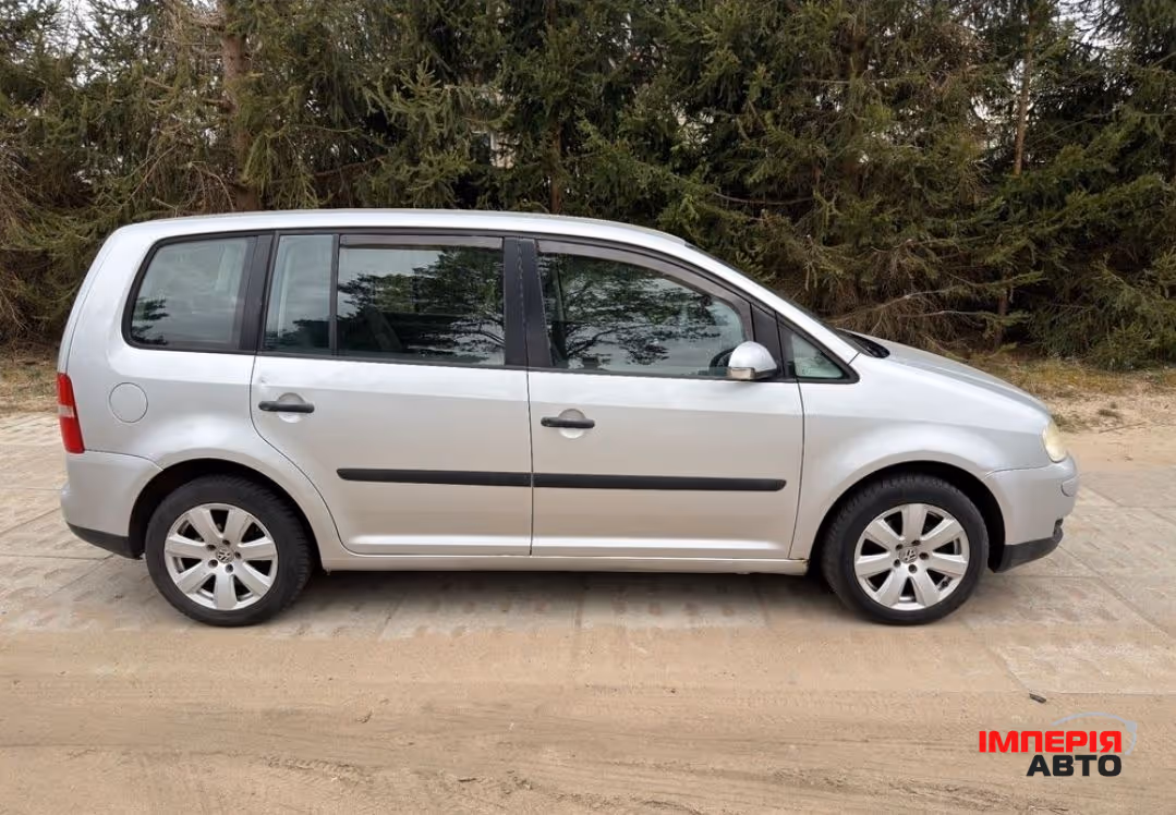 Volkswagen Touran - фото 5