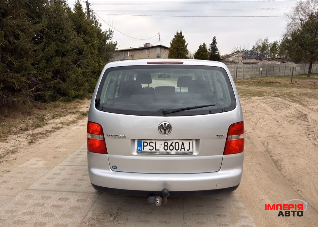 Volkswagen Touran - фото 3