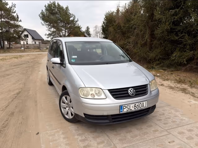 Volkswagen Touran - фото 2