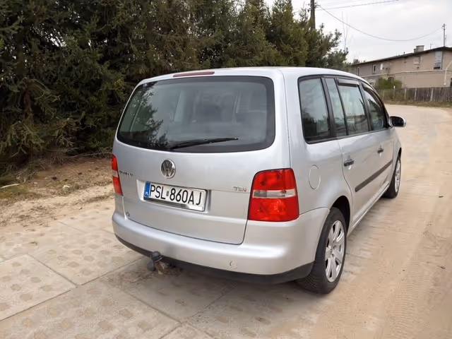 Volkswagen Touran - фото 4