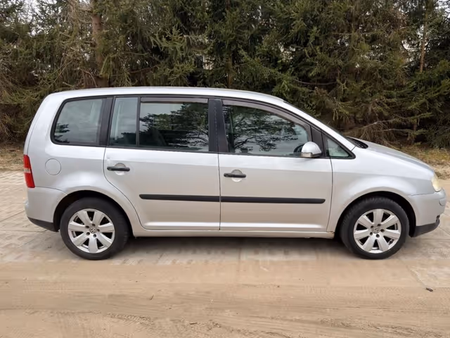 Volkswagen Touran - фото 5