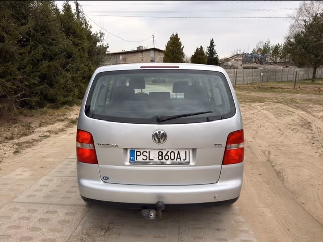 Volkswagen Touran - фото 3