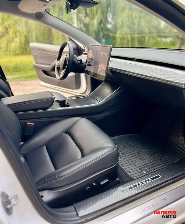 Tesla Model 3 - фото 8