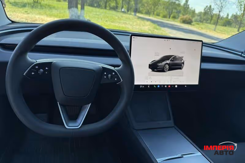 Tesla Model 3 - фото 9