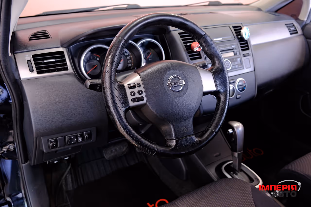 Nissan Tiida - фото 7