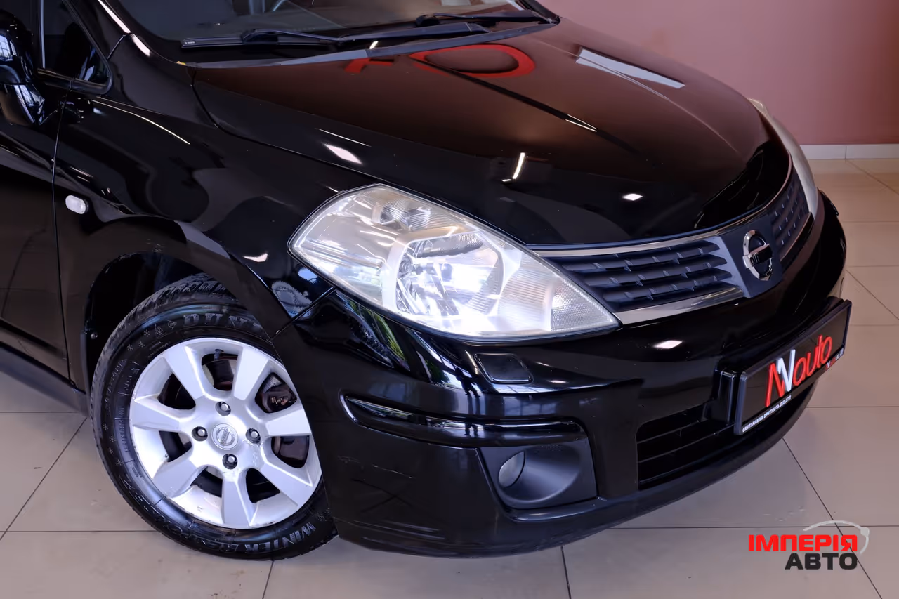 Nissan Tiida - фото 3