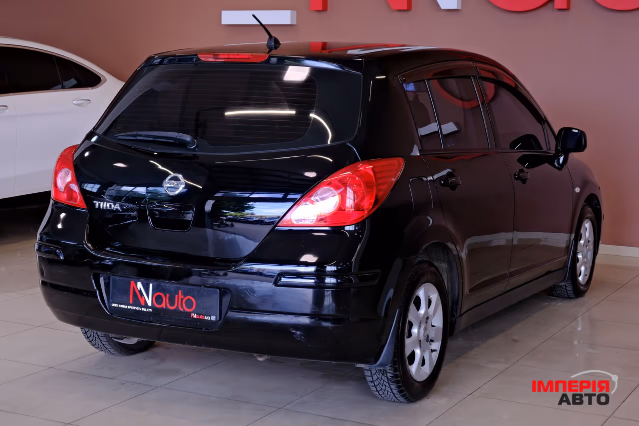 Nissan Tiida - фото 5