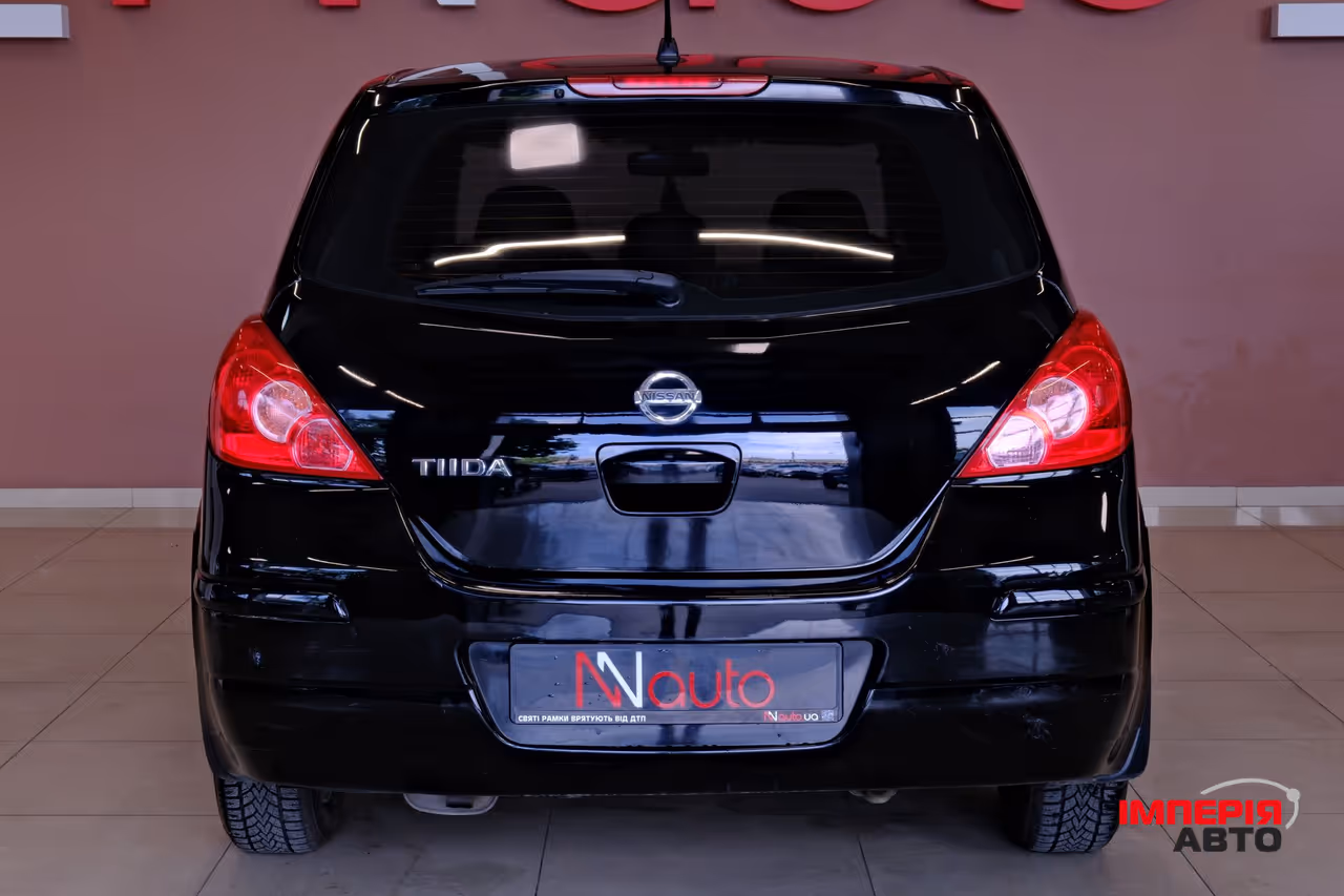 Nissan Tiida - фото 6