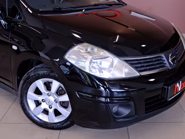 Nissan Tiida - фото 3