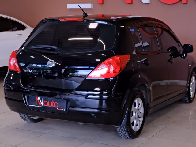 Nissan Tiida - фото 5