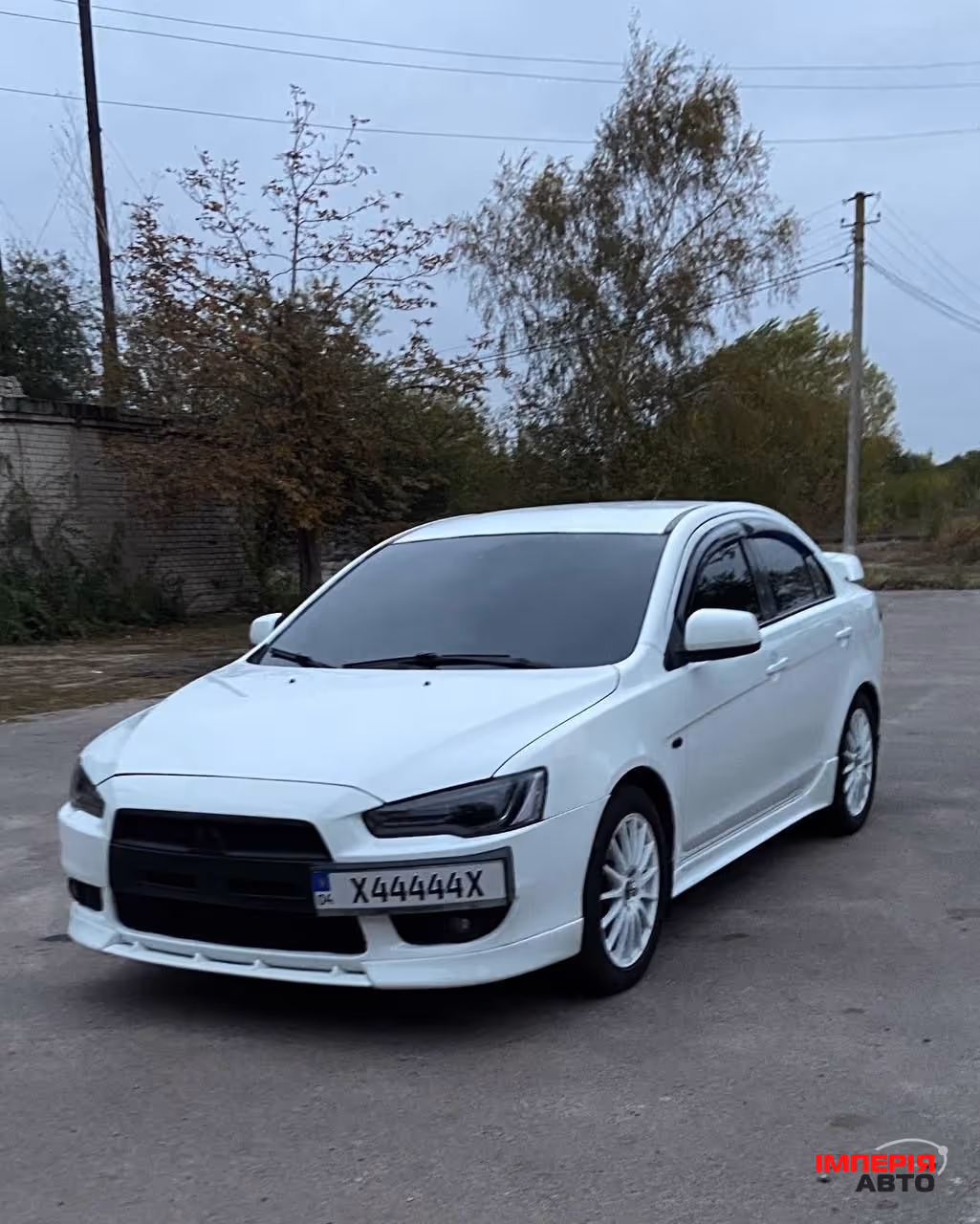 Mitsubishi Lancer - фото 4