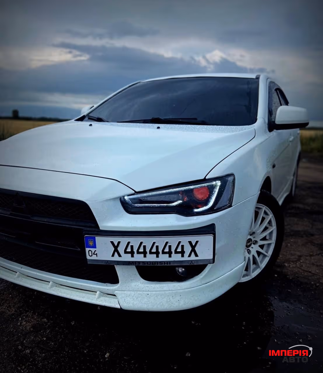 Mitsubishi Lancer - фото 1