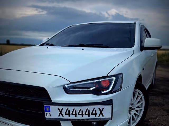 Mitsubishi Lancer - фото 1