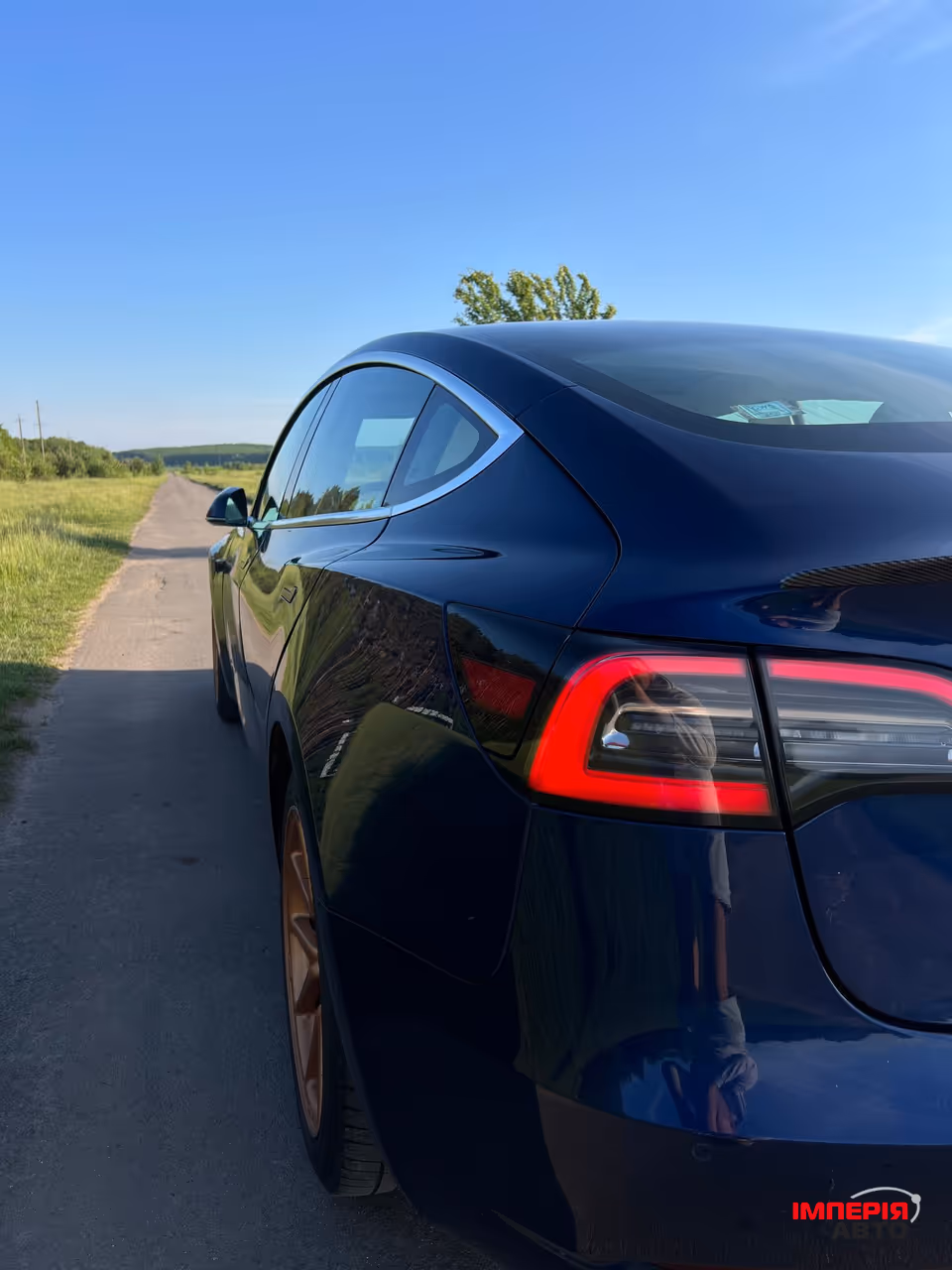 Tesla Model 3 - фото 9