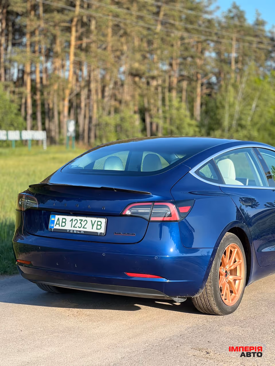 Tesla Model 3 - фото 16