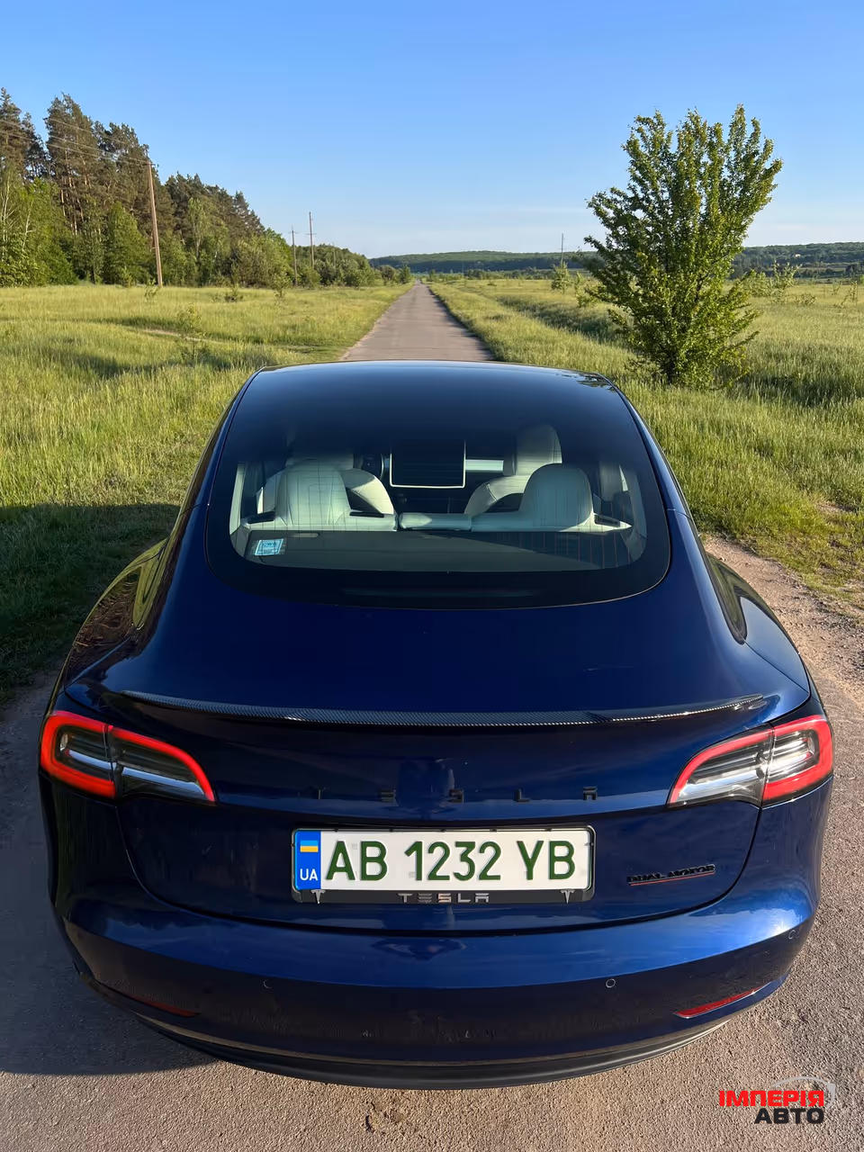 Tesla Model 3 - фото 10