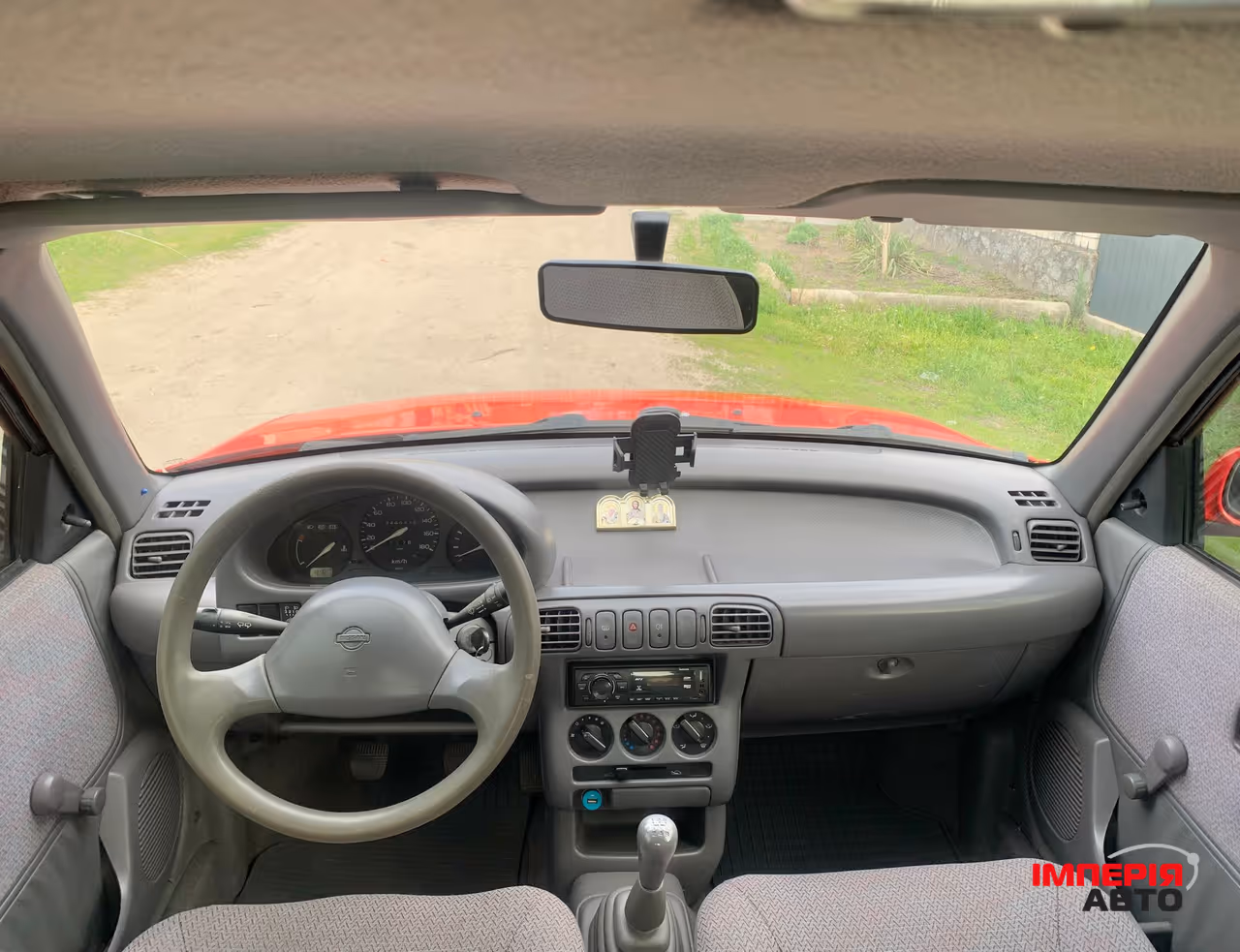 Nissan Micra - фото 11