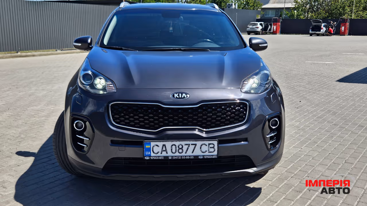 Kia Sportage - фото 1