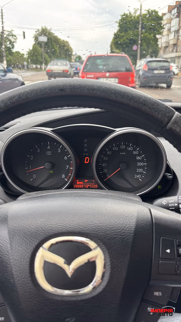 Mazda 3 - фото 13