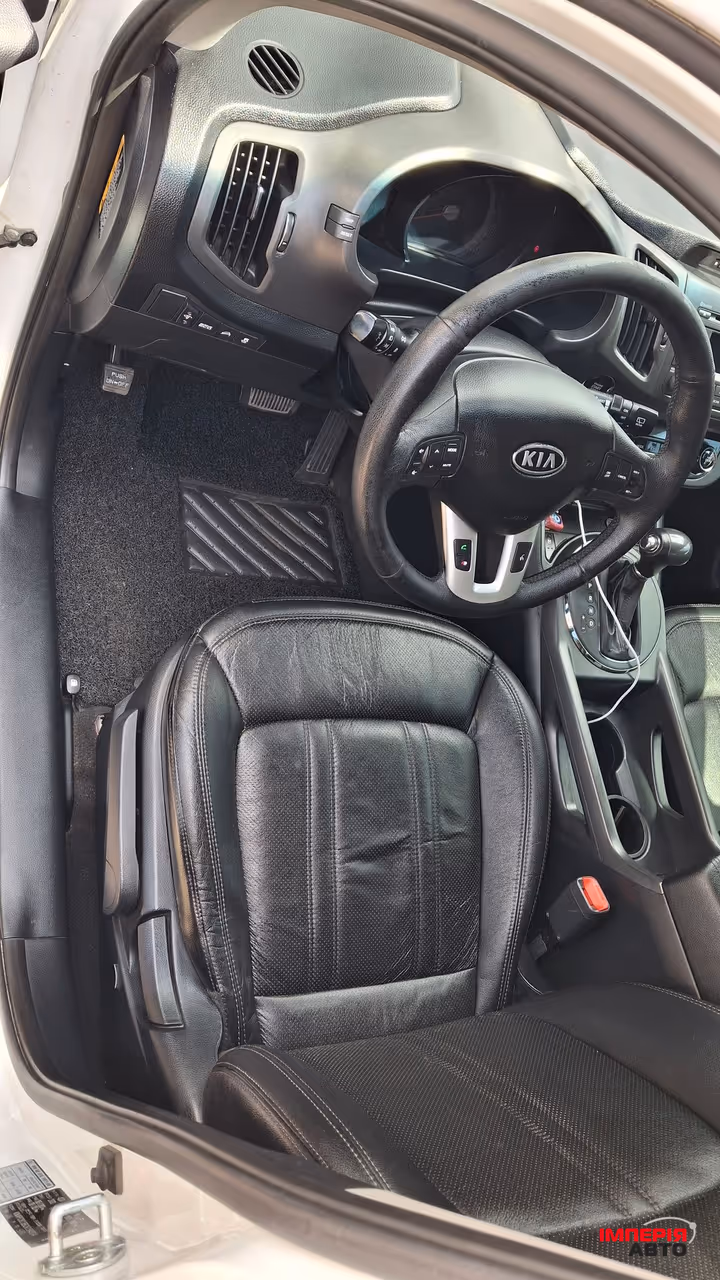 Kia Sportage - фото 14