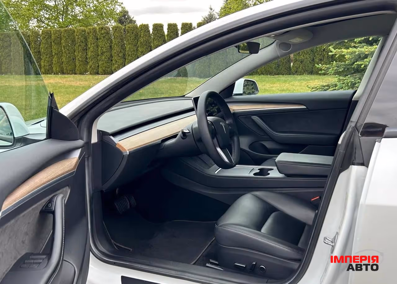 Tesla Model 3 - фото 9