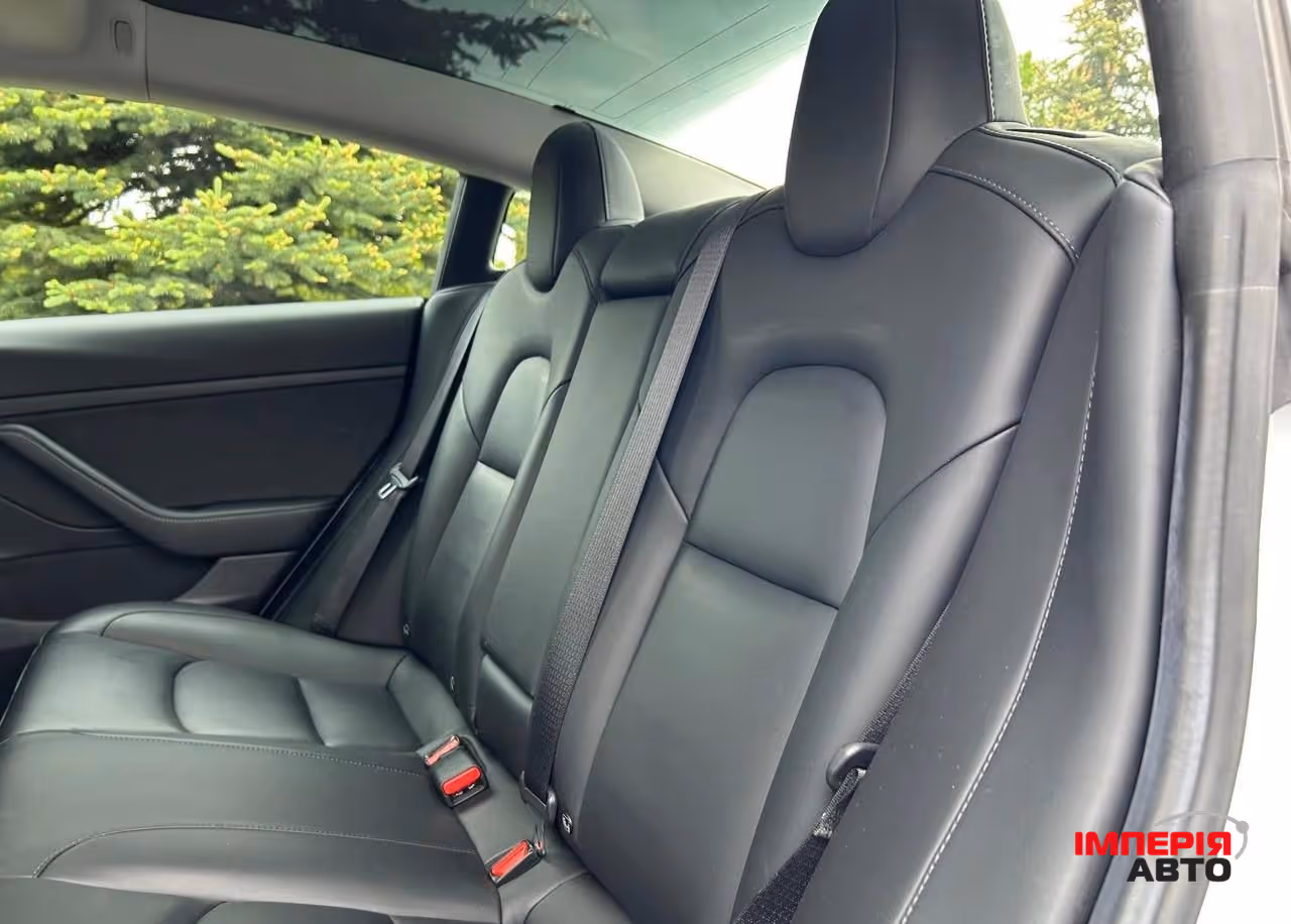 Tesla Model 3 - фото 10