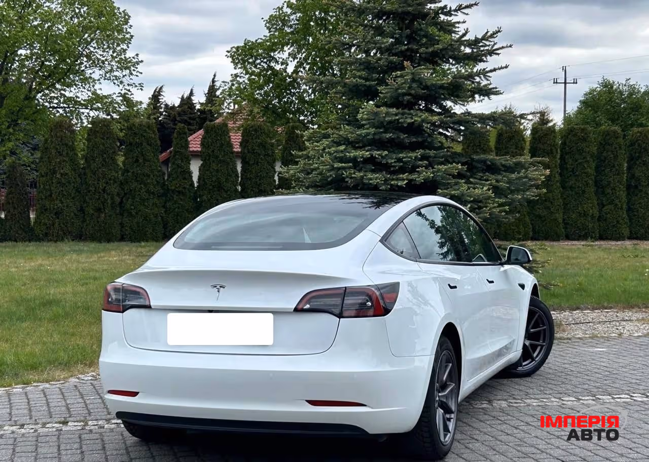 Tesla Model 3 - фото 8