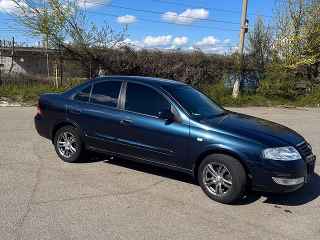 Nissan Almera Classic - фото 4