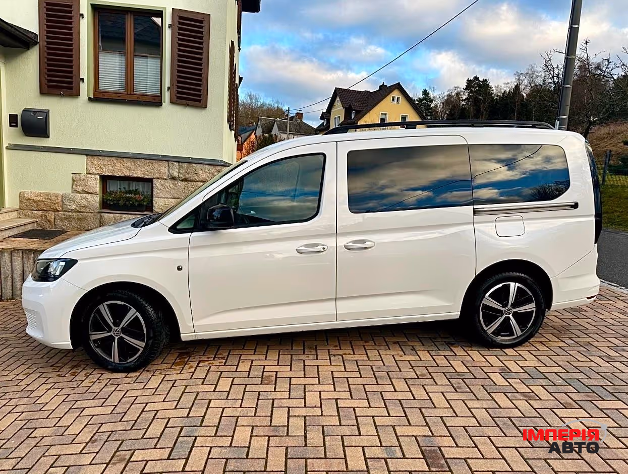 Volkswagen Caddy - фото 1