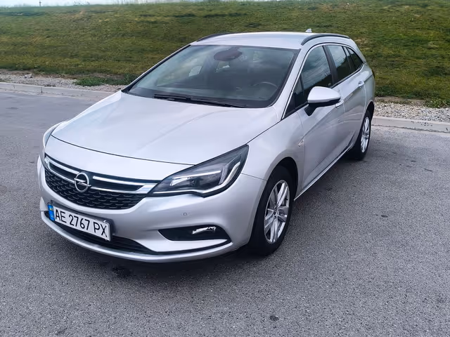 Opel Astra - фото 1
