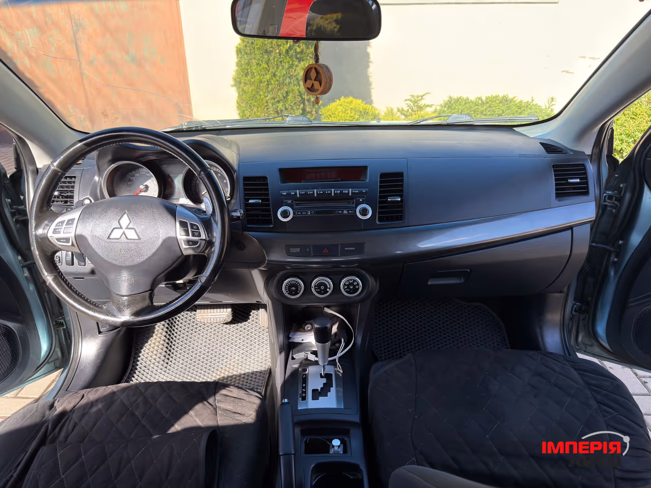 Mitsubishi Lancer - фото 14