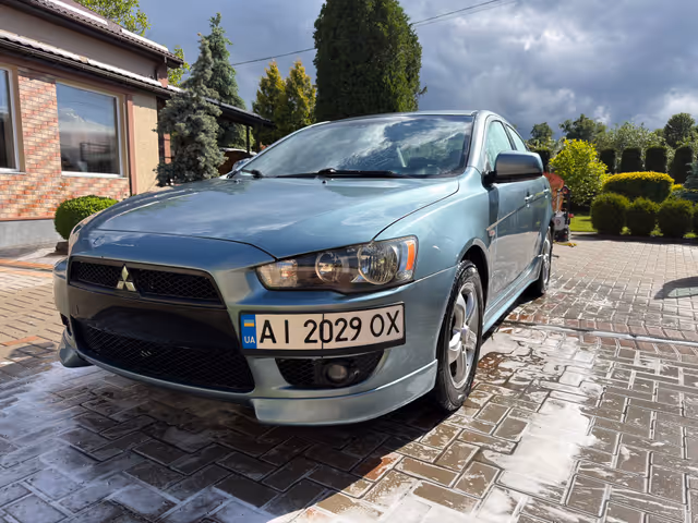 Mitsubishi Lancer - фото 1